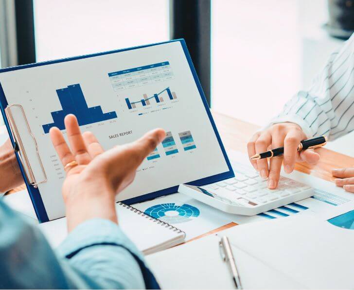 Marketers reviewing audience and discovery research for digital advertising client