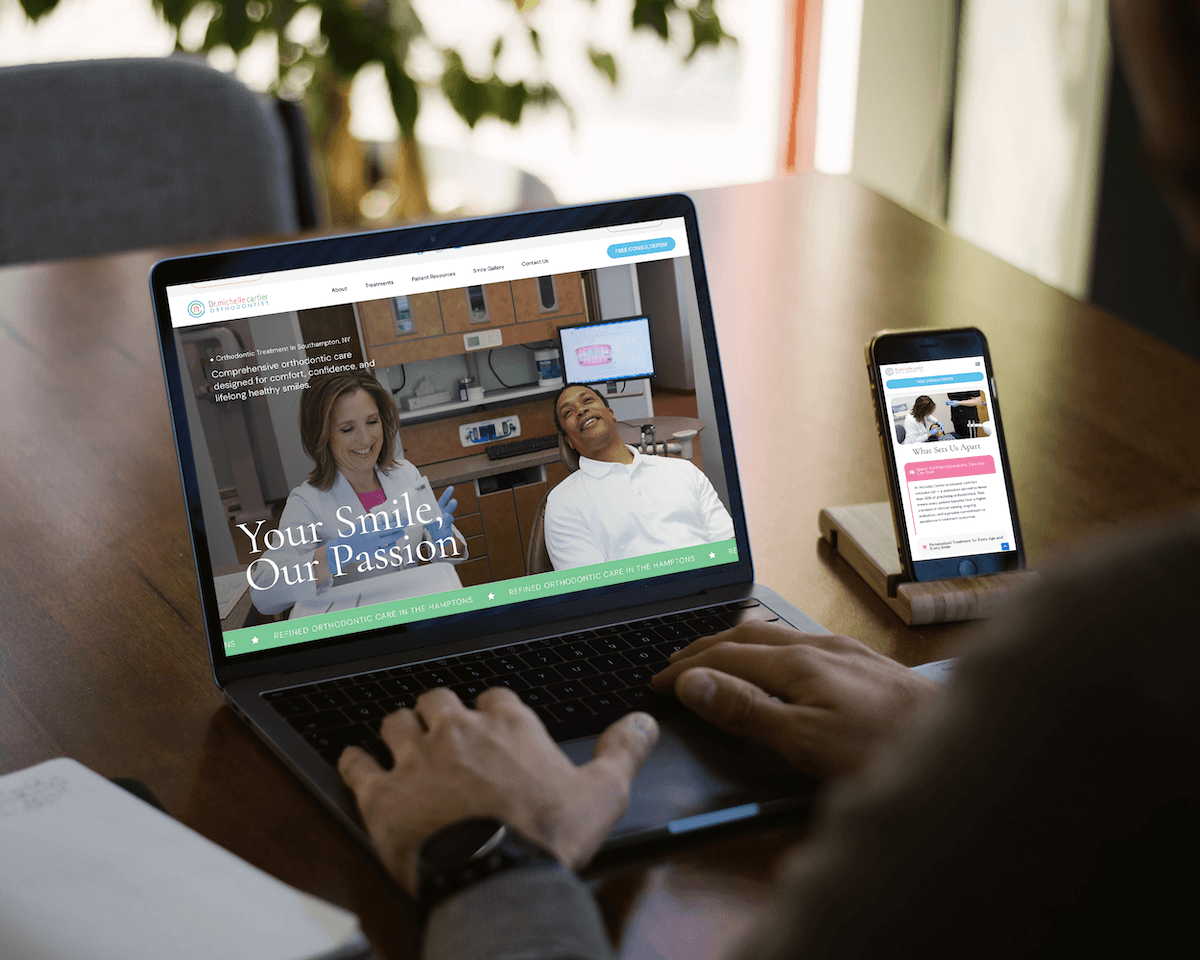 Person viewing an orthodontic website on desktop and mobile.