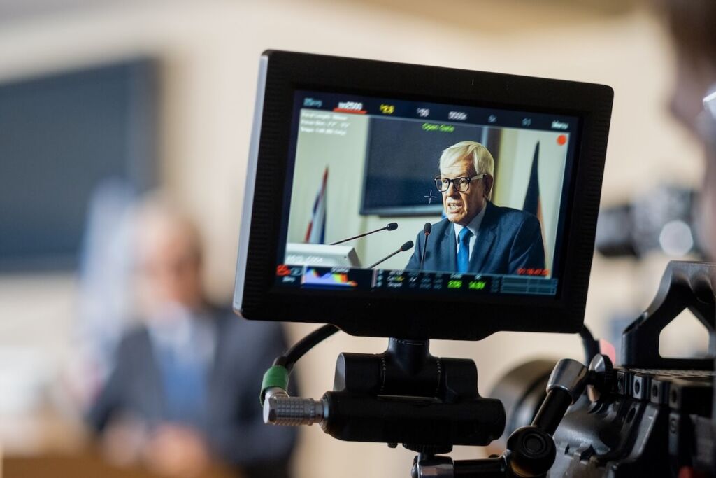 Behind the scenes look at a lawyer filming a commercial