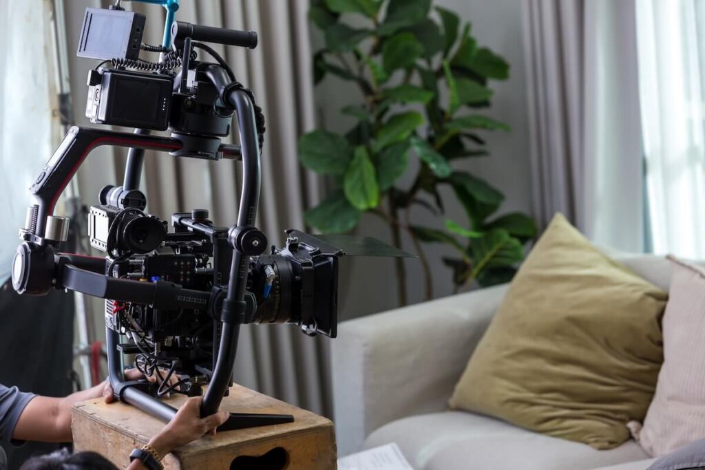 videographer filming the inside of a staged home for sale